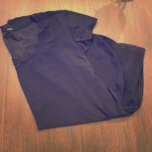 Lululemon cap-sleeve workout top with hip flair.